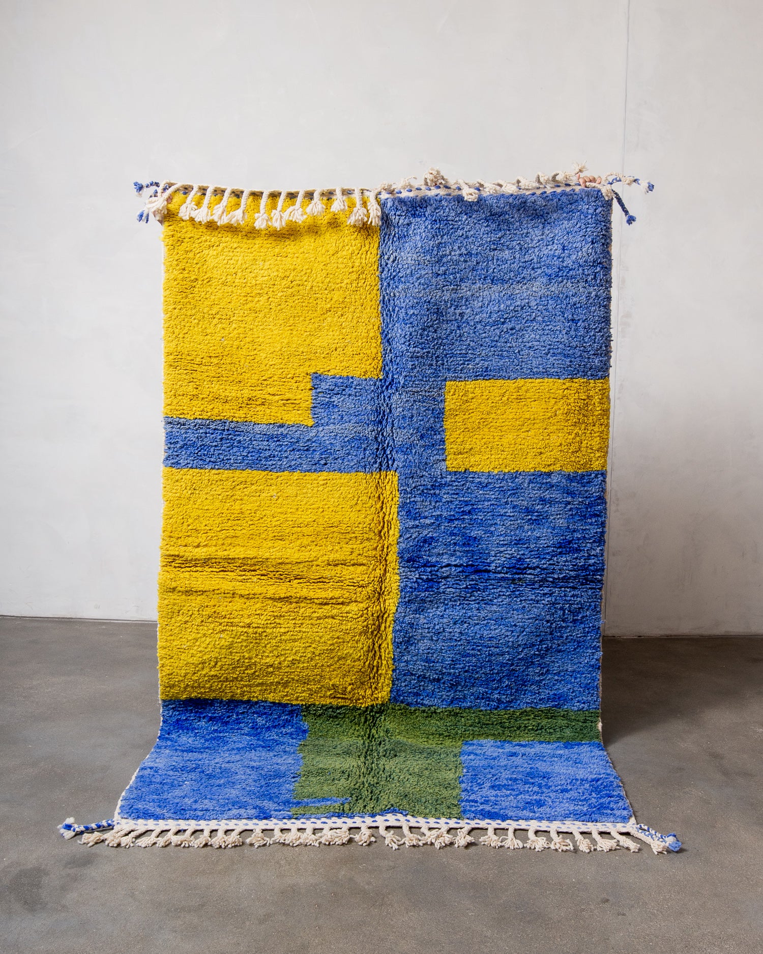 Modern, designer, handcrafted Berber rug from Morocco. Beniourain carpet with beautiful colours and patterns and fluffy wool texture.